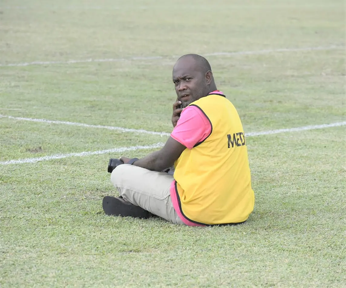 Carlos Aruafa covering a TSL match at Lawson Tama stadium.