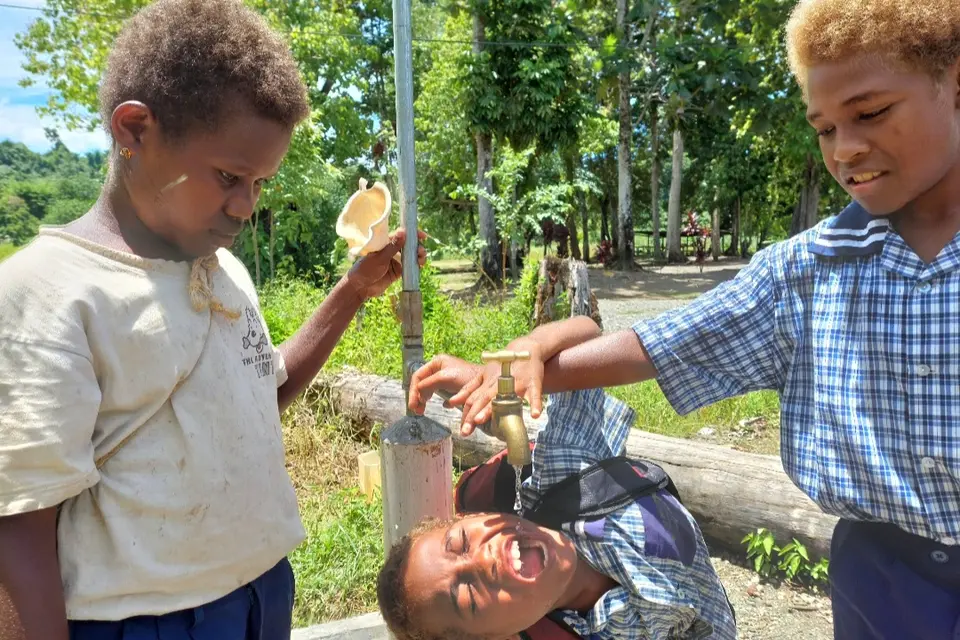 These students are now able to access safe drinking water from the school standpipe, provided by the CBSP water supply program.