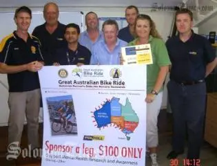 Ross pictured with Ian Stewart, PDL Toll Manager (right) and the PDL Toll team.