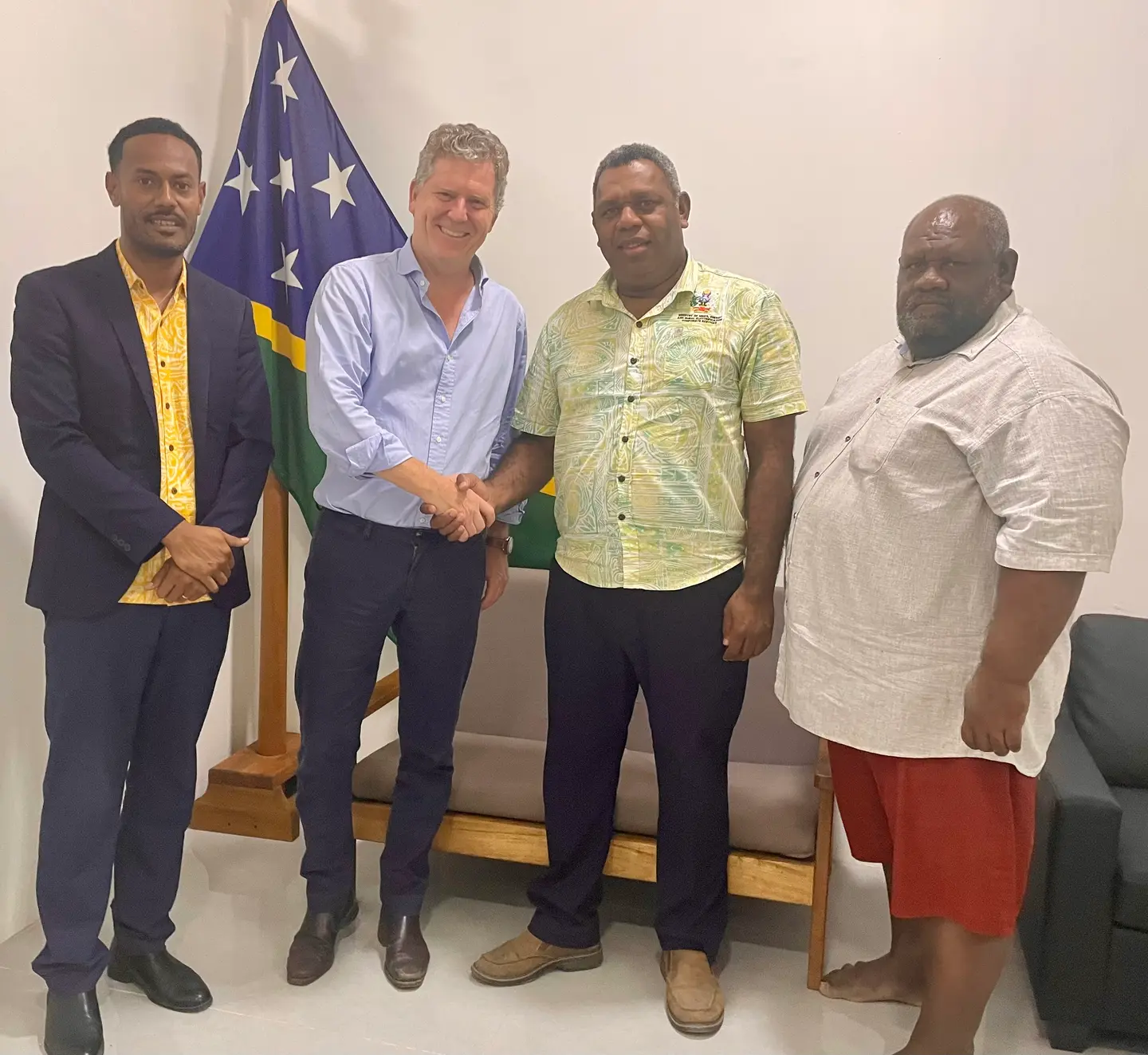 British High Commissioner Paul Turner with Permanent Secretary Chris Vehe, William Kadi and Director Gabriel Aimaea.
