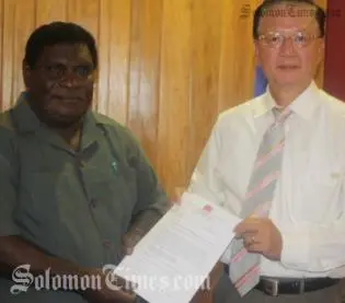 Prime Minister, Hon. Danny Philip and ROC Ambassador, Roy Wu, at the Handover of National Parliament Office Complex solar project.