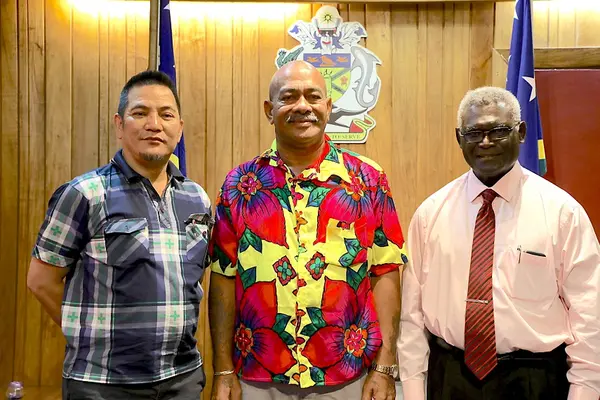 Chairman of Caucus Namson Tran, MP for MOI Martin Kealoe and Prime Minister Sogavare.