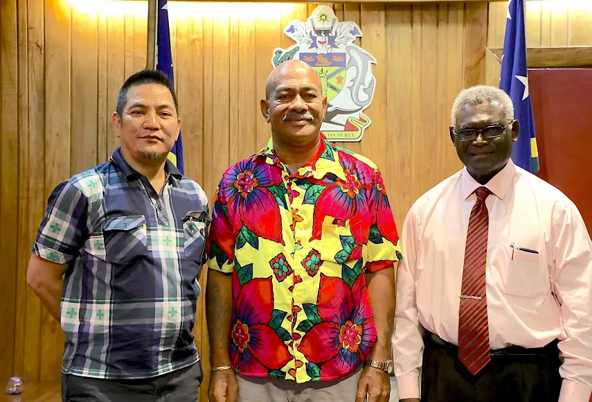 Chairman of Caucus Namson Tran, MP for MOI Martin Kealoe and Prime Minister Sogavare.