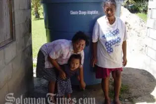 Water tanks on Aitutaki, Cook Islands, as part of a project to ensure safe drinking water for families adapting to climate change.
