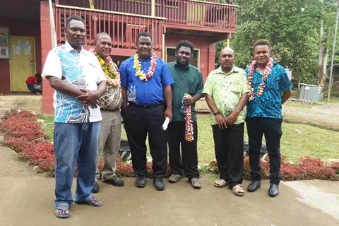 Officials from the Opposition with the Vura School principal and his deputy during the visit last week Friday.
