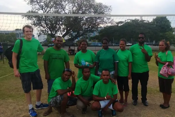 The PSO “Green Hornets” volleyball team after a hard fought victory. From left to right, back row: Clancy Dane, Daniel Kwalai, Tina Haro, Kathleen Kohata, Ethel Ratu, Lazarus Waroka, Martha Manaka. Front: Wesley Ramo, Peter Herehura, Leonard Chite.