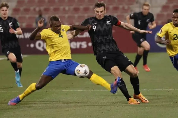 Chris Wood and Leon Kofana battle for the ball.