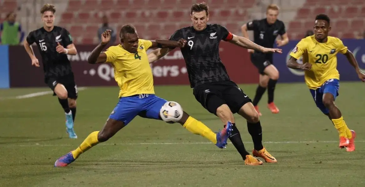 Chris Wood and Leon Kofana battle for the ball.