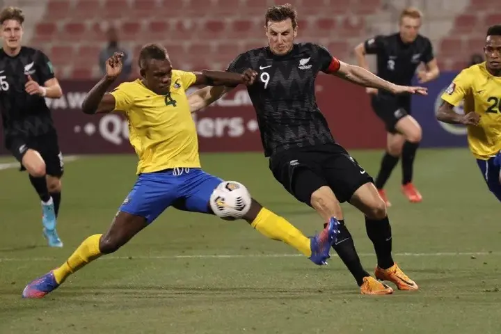 Chris Wood and Leon Kofana battle for the ball.
