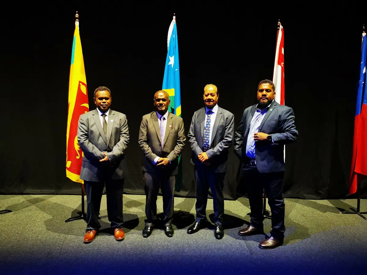 Minister of Foreign Affairs and External Trade, Hon. Jeremiah Manele (second left) at the 8th Bali Process Ministerial Conference held in Adelaide, South Australia. Here he is joined by Deputy Secretary MFAET, Cornelius Walegerea, H.E. Robert Sisilo and Solomon Islands Chamber of Commerce (SICCI) Board Chairman Ricky Fuo'o.