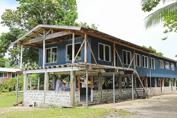 The two-story community hall 2020/2022 project comprised of six accommodation room upstairs, a big conference room for meetings and an office space. Ablution block (shower & toilet system rooms) located downstairs.