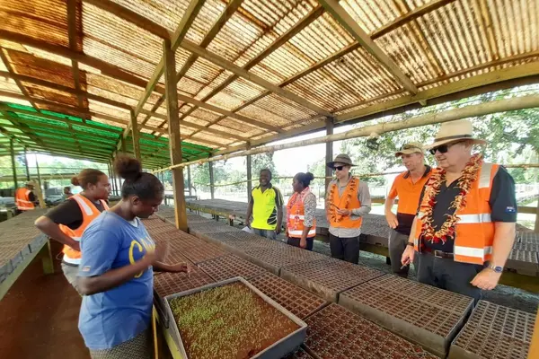 KFPL employees showing the Honourable Minister and Member of Parliament for Gizo/Kolombangara, Lanelle Tanandaga and The Australian High Commissioner, Dr Lachlan Strahan the plant nurseries used by local out-growers.