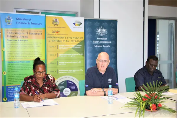 The Australian High Commissioner, His Excellency Dr. Lachlan Strahan (center), Permanent Secretary McKinnie P Dentana (right) and the Deputy Secretary Margaret Moveni (left) participated in the SIG ICT Services launch at the SIG ICT Office.