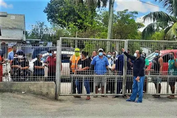 People queue for food in Tonga on Wednesday February 2, 2022.