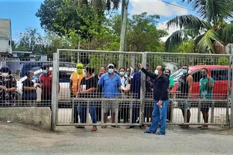 People queue for food in Tonga on Wednesday February 2, 2022.
