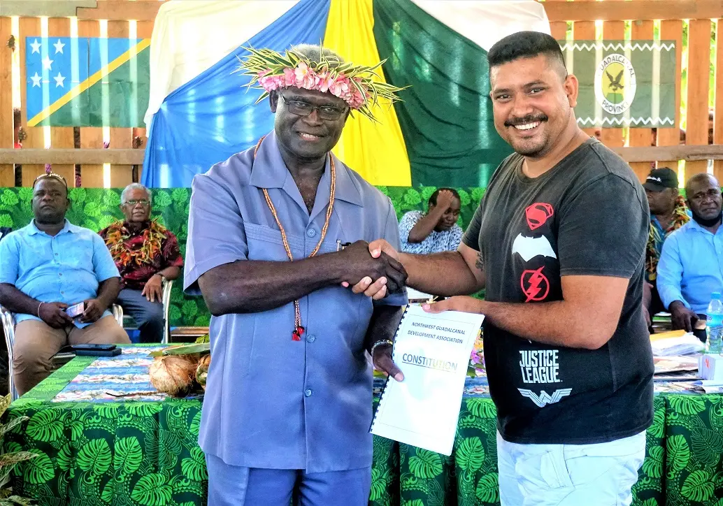Prime Minister Manasseh Sogavare with Simon Chottu, Chairman of the North West Guadalcanal Development Association (NWGDA), during the launching of the NWGDA constitution.