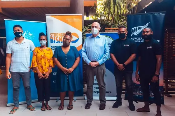 Australian High Commissioner to the Solomon Islands, Dr. Lachie Strahan with young entrepreneurs that were awarded with the grant through YECSI.