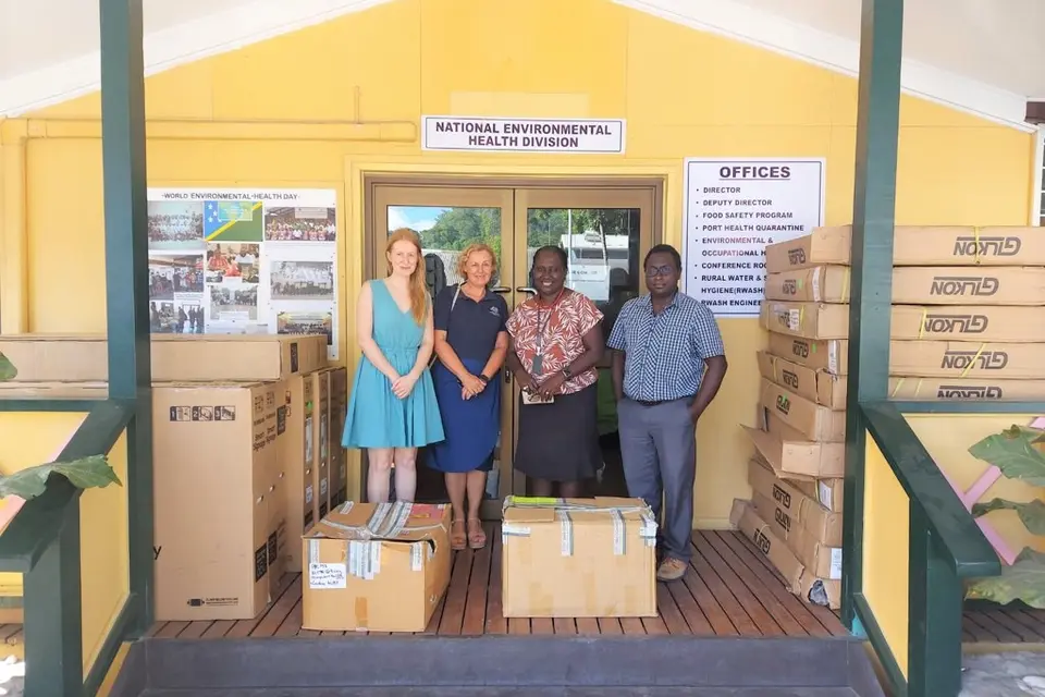 Group photo with the equipment in their boxes, (L-R) AHC COVID-19 Support Coordinator Ms. Laura Wilson, AHC Counsellor for Human Development Ms. Julie McCallum, MHMS Permanent Secretary Mrs. Pauline McNeil & MHMS Deputy Secretary Health Care Dr Gregory Jilini.