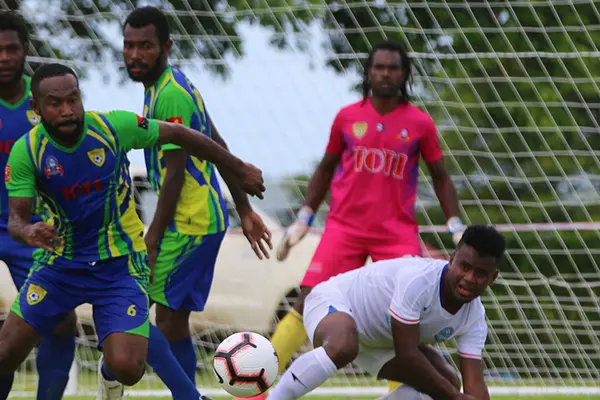 Players scramble for the ball during the Lae City vs Henderson Eels clash in Group B of the OFC Champions League in Luganville on Saturday.