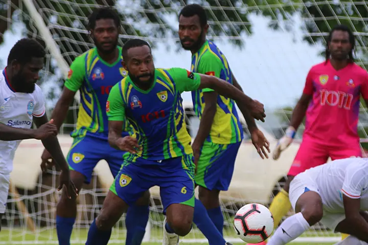 Players scramble for the ball during the Lae City vs Henderson Eels clash in Group B of the OFC Champions League in Luganville on Saturday.