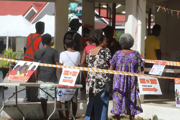 Voters in Central Honiara casting their ballot yesterday.