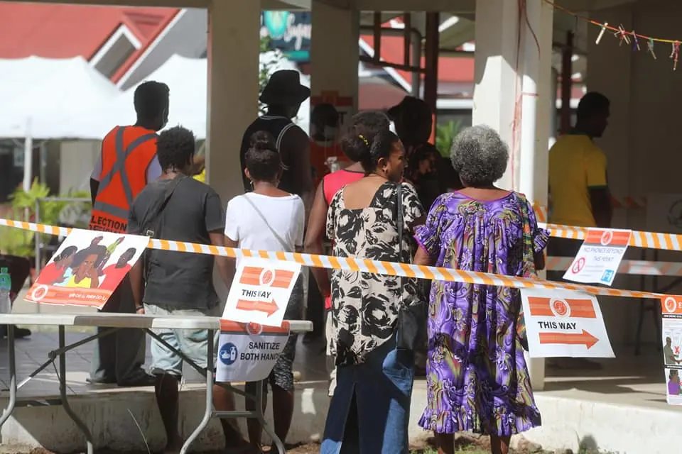 Voters in Central Honiara casting their ballot yesterday.