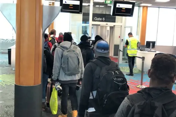 Solomon Islanders boarding Solomon Airlines at the Auckland International Airport.