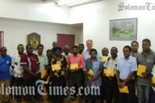 The representatives of twelve community groups during the handover this week.