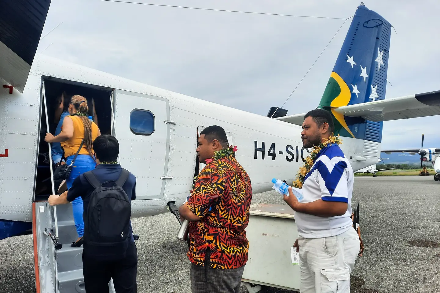 Passengers boarding the VIP scenic flight prior to pilot briefing and take off at Henderson Airport.