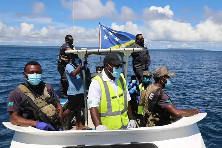 Border enforcement agencies escorted the two men back to the border with Bougainville.