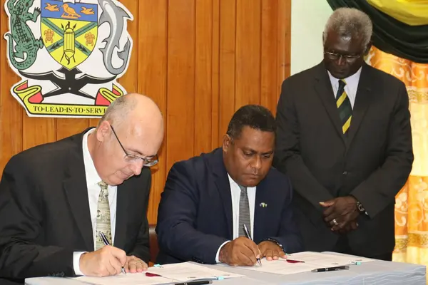 The signing took place at the Office of the Prime Minister & Cabinet (OPMC) by the Minister of Planning and Development Coordination, Hon Rexon Ramofafia and the Australian High Commissioner, His Excellency Dr Lachlan Strahan.