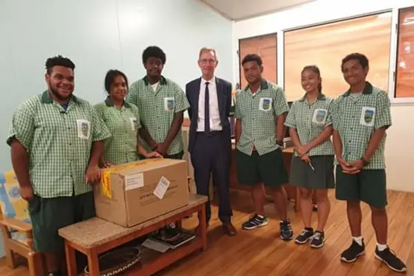 Team Solomon's and the School Principal of Woodford International School. They will represent Solomon Islands in the 2019 First Global Robotics Competition in Dubai.