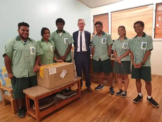 Team Solomon's and the School Principal of Woodford International School. They will represent Solomon Islands in the 2019 First Global Robotics Competition in Dubai.