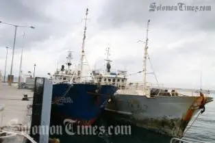 The two Foreign Fishing vessels at the Police Maritime Wharf at Aola Base.