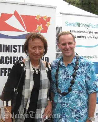 Honorable John Key, Prime Minister of New Zealand, and the Honorable Georgina te Heuheu, Pacific Island Affairs Minister, visit the SendMoneyPacific Stand during Pasifika Festival, 13th March 2010