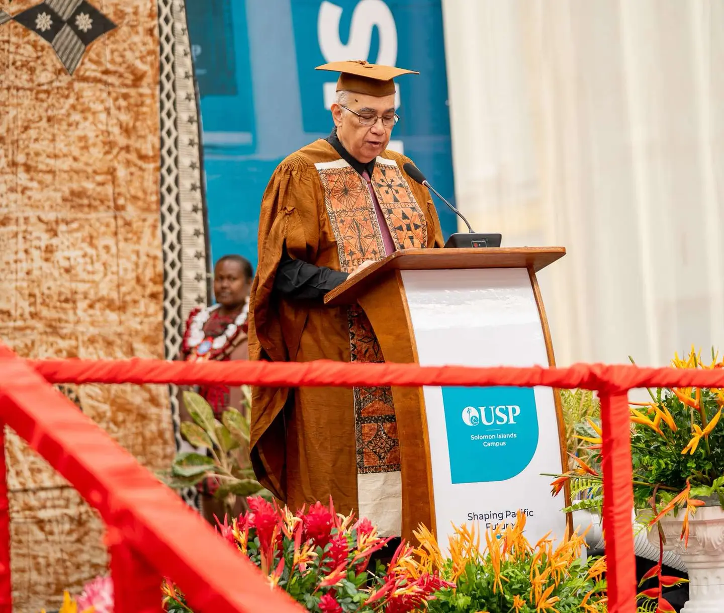 USP Pro-Chancellor and Chair of Council and Interim Management Group Siosiua Utoikamanu delivers the graduation address at the USP Solomon Islands Campus graduation at Friendship Hall in Honiara.