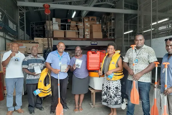 Dr Zelalem Taffesse of UNICEF with the Permanent Secretary of the Ministry of Health and Medical Services Ms Pauline McNeil and her staff during the handover.