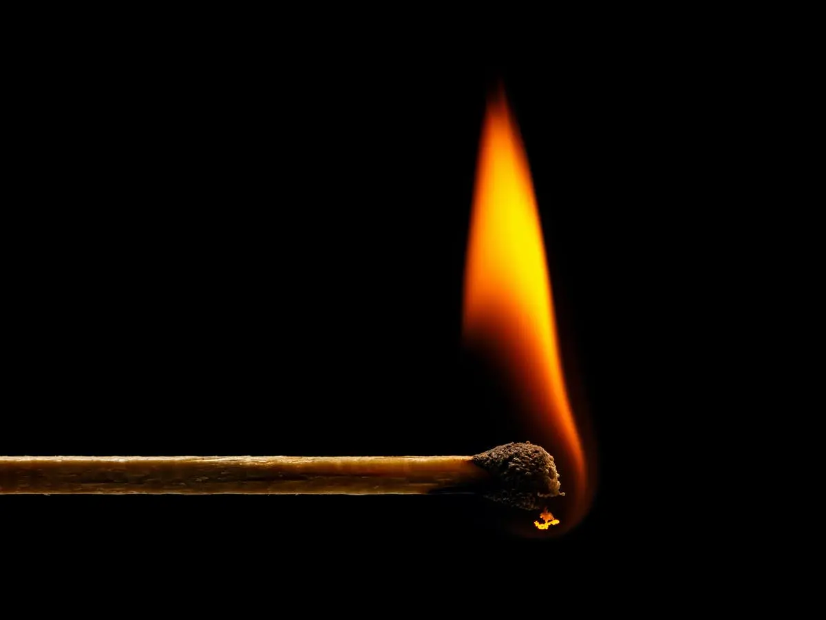 The incident report states that the suspect went to the victim’s dwelling house and lit a fire on the walling while the victim was sleeping.