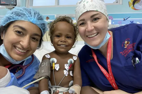 Little Beverlyn with members of the specialist team after her surgery.
