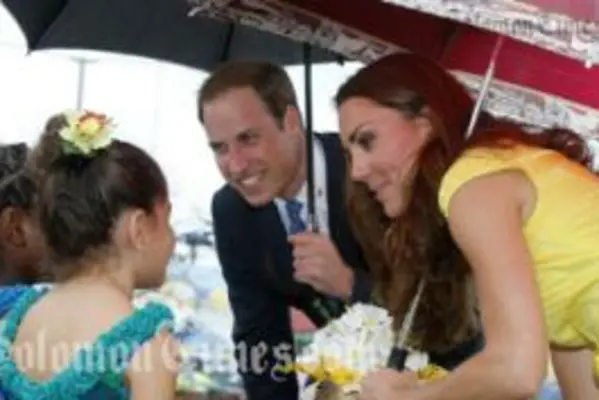 The Royal Couple during the opening of the Commonwealth St yesterday.