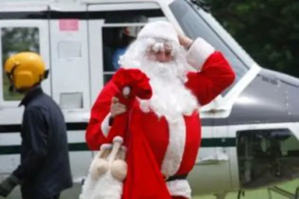 Santa adjusts his hat after a landing practice for next week's 'Carols in the Islands', to be held at Lawson Tama Stadium on Saturday 12 December.