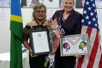 Ambassador Gray with Mrs Sigimanu at the award ceremony.