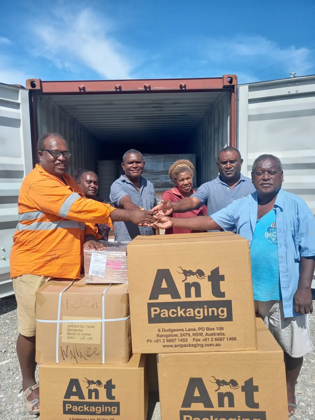 Cornelius Donga hands over the equipment to recipients.