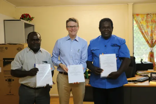 Australian High Commissioner Rod Brazier (middle) with Permanent Secretary MOFT, Harry Kuma (left)  and A/g Permanent Secretary MHMS, Arnold Moveni (right) after signing an agreement committing Australia to a new phase of support to the Solomon Islands health sector.