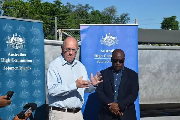 Australia's High Commissioner H.E Dr Lachlan Strahan and Minister for Police, National Security and Correctional Services, Hon. Anthony Veke.