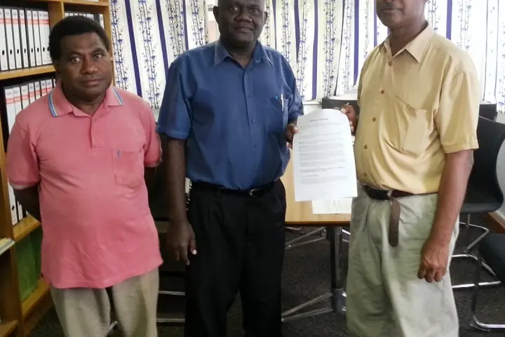 From (L-R)Pacific Printers Sales Representative McPerson Taro, Secretary to Cabinet James Remobatu and Pacific Printer's GM Nathaniel Hebala