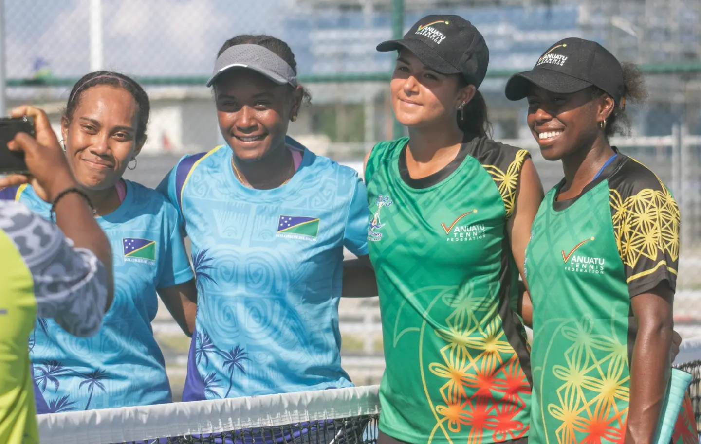 Solomon Islands (left) remain unbeaten in the women’s teams event.