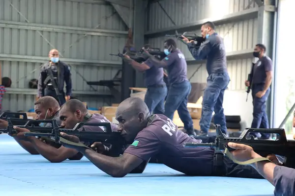 RSIPF officers train using the recently donated replica guns.