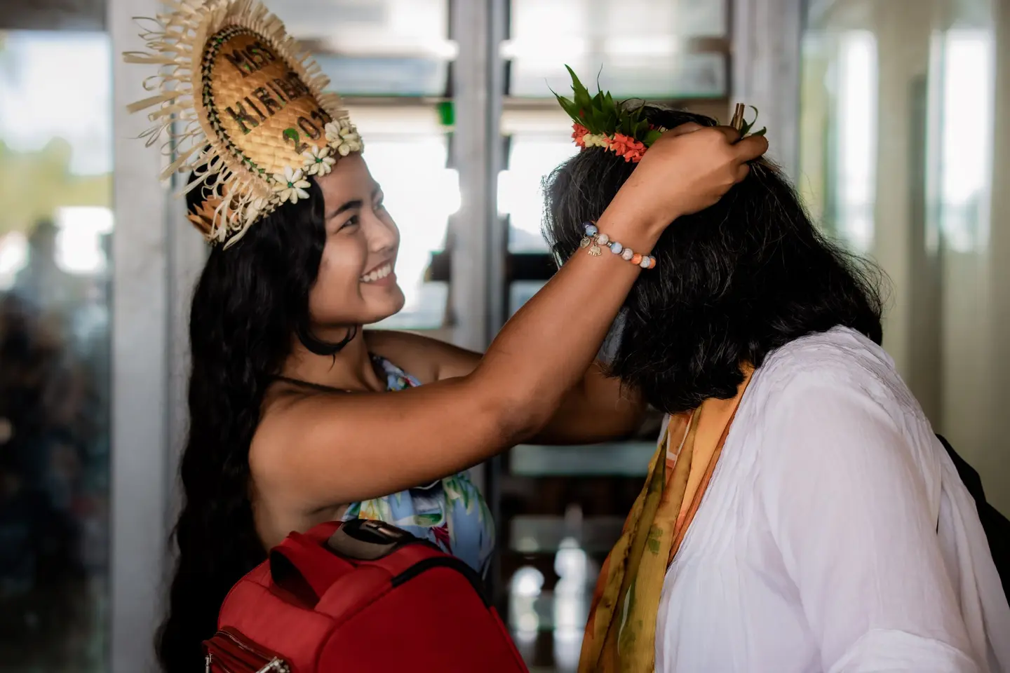 At the arrival’s concourse, passengers were greeted by reigning Miss Kiribati, Paepae Kilei and staff of the Tourism Authority of Kiribati (TAK) who garlanded travellers and returning resident’s with katoka-bau, the traditional Kiribati floral head piece presented to special guests.