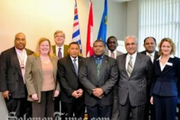 Foreign Minister Peter Shanel and Education Minister Dick Ha&#39;amori with government officials and staff of the Kwantlen Polytechnic University in Canada. 
